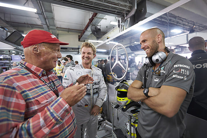 Niki Lauda and Nico Rosberg in the Mercedes garage.